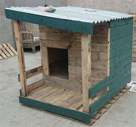 Our company has pallets that we would like to get rid of for free. . Pallet dog house